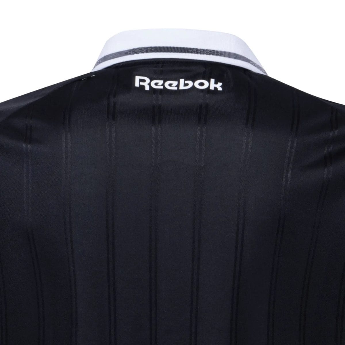Back view of a dark, vertically striped jacket or shirt with a white collar featuring the white 'Reebok' logo.