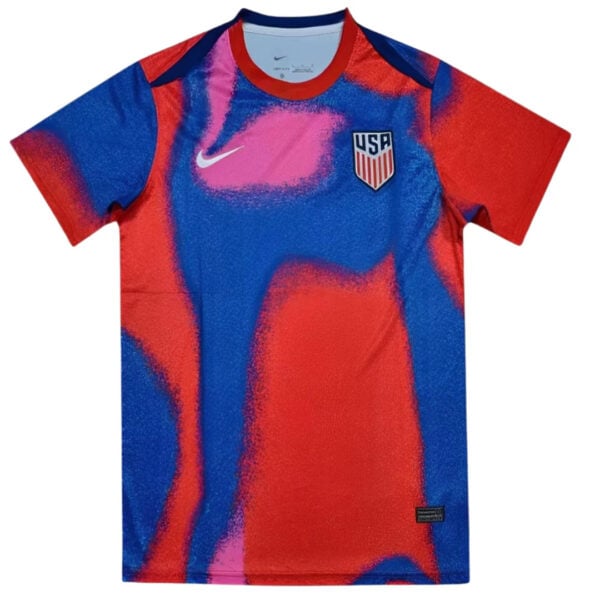 USA soccer jersey with blue and red abstract pattern, white Nike swoosh on the left chest and a USA crest on the right chest.