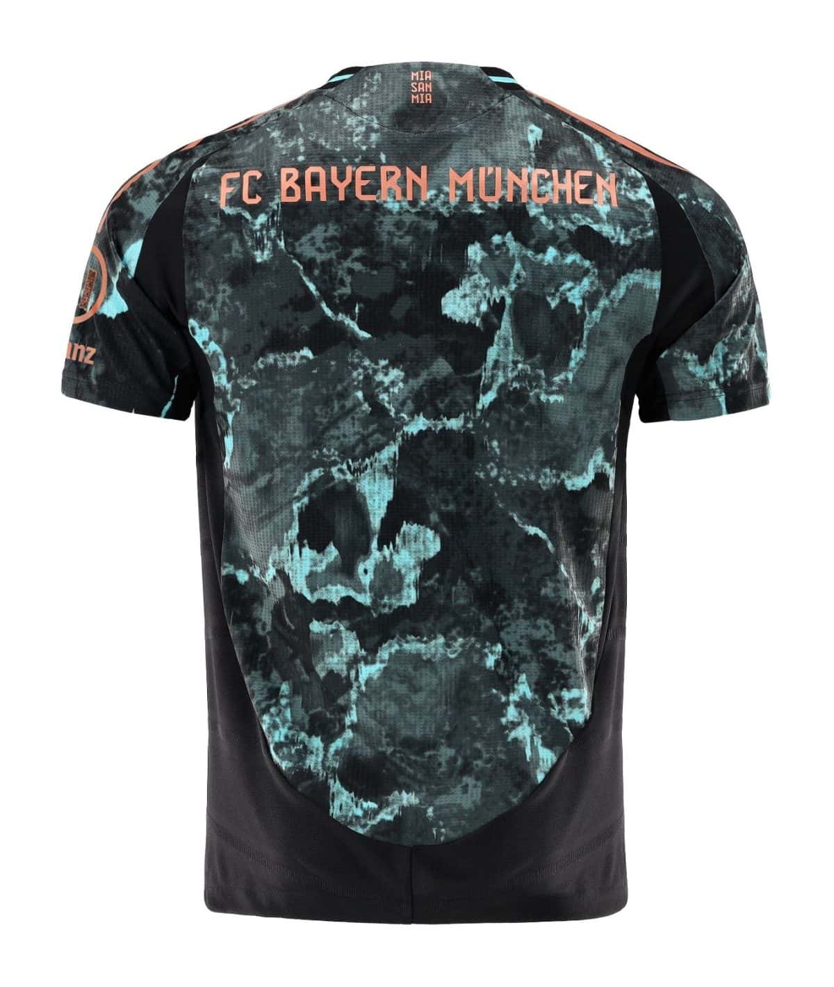 Back view of a teal and black tie-dye FC Bayern München jersey with orange lettering across the shoulders (FC BAYERN MÜNCHEN).