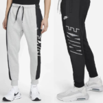 Two Nike joggers shown on models: gray pair with black side panel and vertical 'NIKE' text, and black pair with gray graphic and swoosh.
