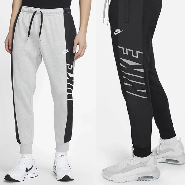 Two Nike joggers shown on models: gray pair with black side panel and vertical 'NIKE' text, and black pair with gray graphic and swoosh.