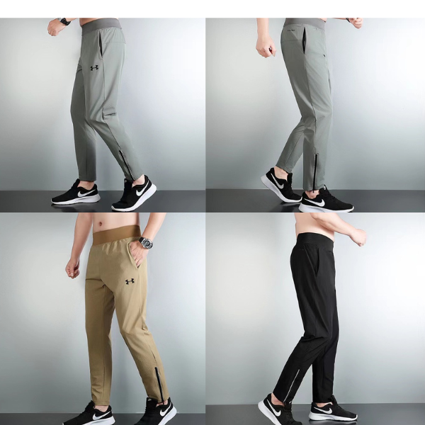 Untitled_design_-_2024-10-04T003831.106 Men's gray jogger pants with ankle zipper, shown in left-profile view on a light background with sneakers.