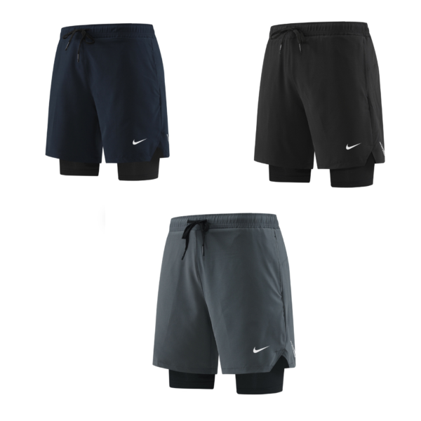 Two Nike athletic shorts shown side by side: navy left and black right, with drawstrings and inner compression shorts visible beneath.