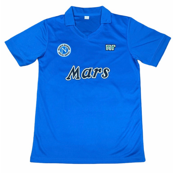 Blue polo shirt with 'Mars' text on chest, circular patch on left chest, and small logo on right chest—front view of a sports jersey