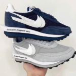 Stack of two Nike Sacai x Fragment sneakers, navy on top and gray underneath, with a white swoosh and midsole text visible.