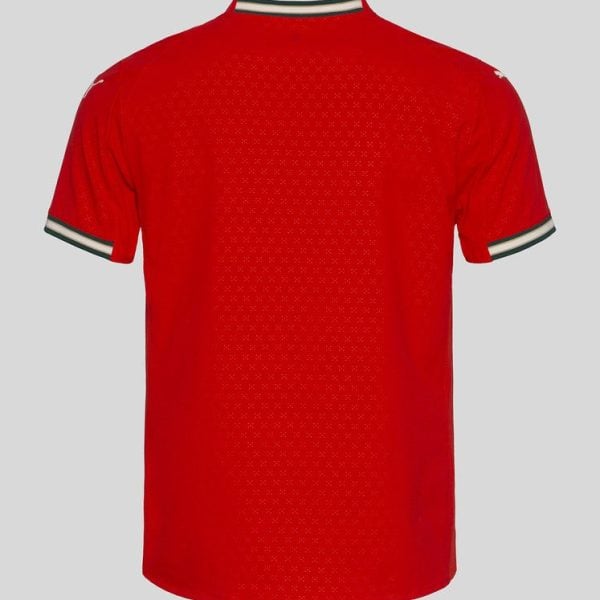 Back view of a red short-sleeve athletic jersey with black-and-white trimmed collar and cuffs.