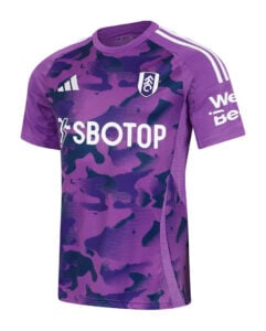 VLTsDMQfI1tnF4K | UAE SPORT STORE Purple camouflage soccer jersey with SBOTOP sponsor, club crest on chest, and white shoulder stripes (short sleeves). In-use as a football kit.