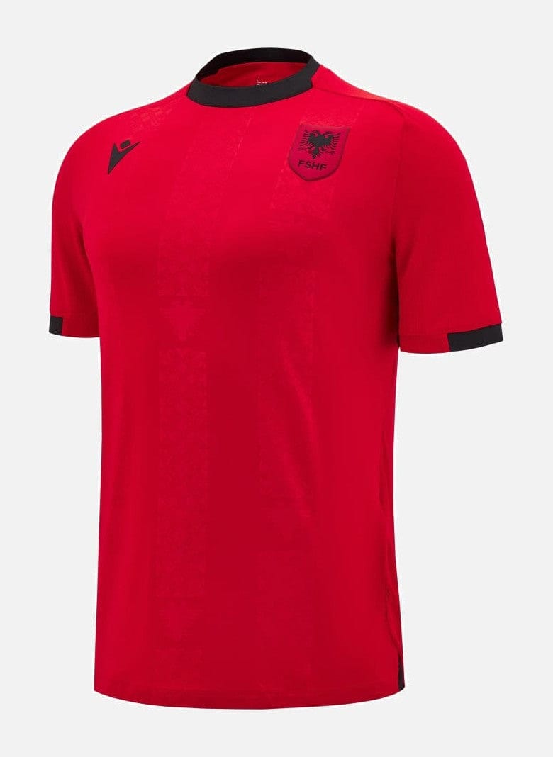 VMzjQTXDQ69Y5AA | UAE SPORT STORE Red soccer jersey with black collar and cuffs, featuring a crest on the left chest and a logo on the right shoulder area.
