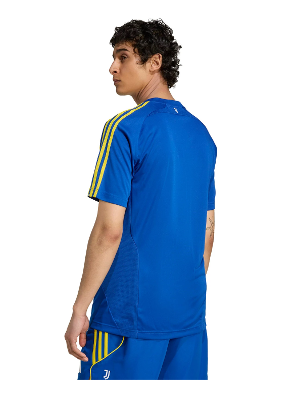 W | UAE SPORT STORE Back view of a man wearing a blue soccer jersey with yellow stripes on the sleeves and matching blue shorts.