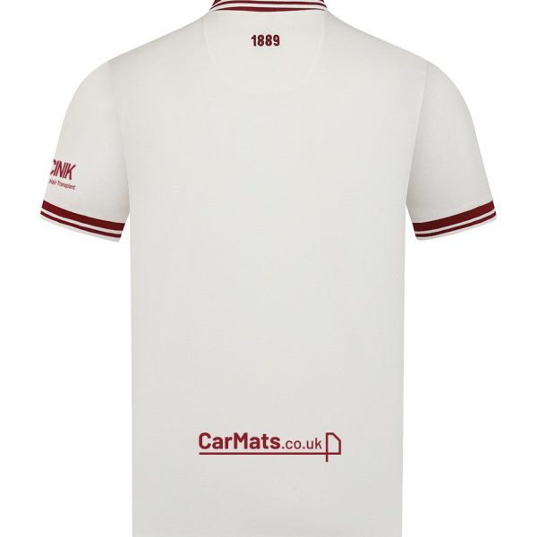 Back view of a white polo shirt with maroon striped collar and cuffs; '1889' on the neck and a 'CarMats.co.uk' sponsor logo near the hem.