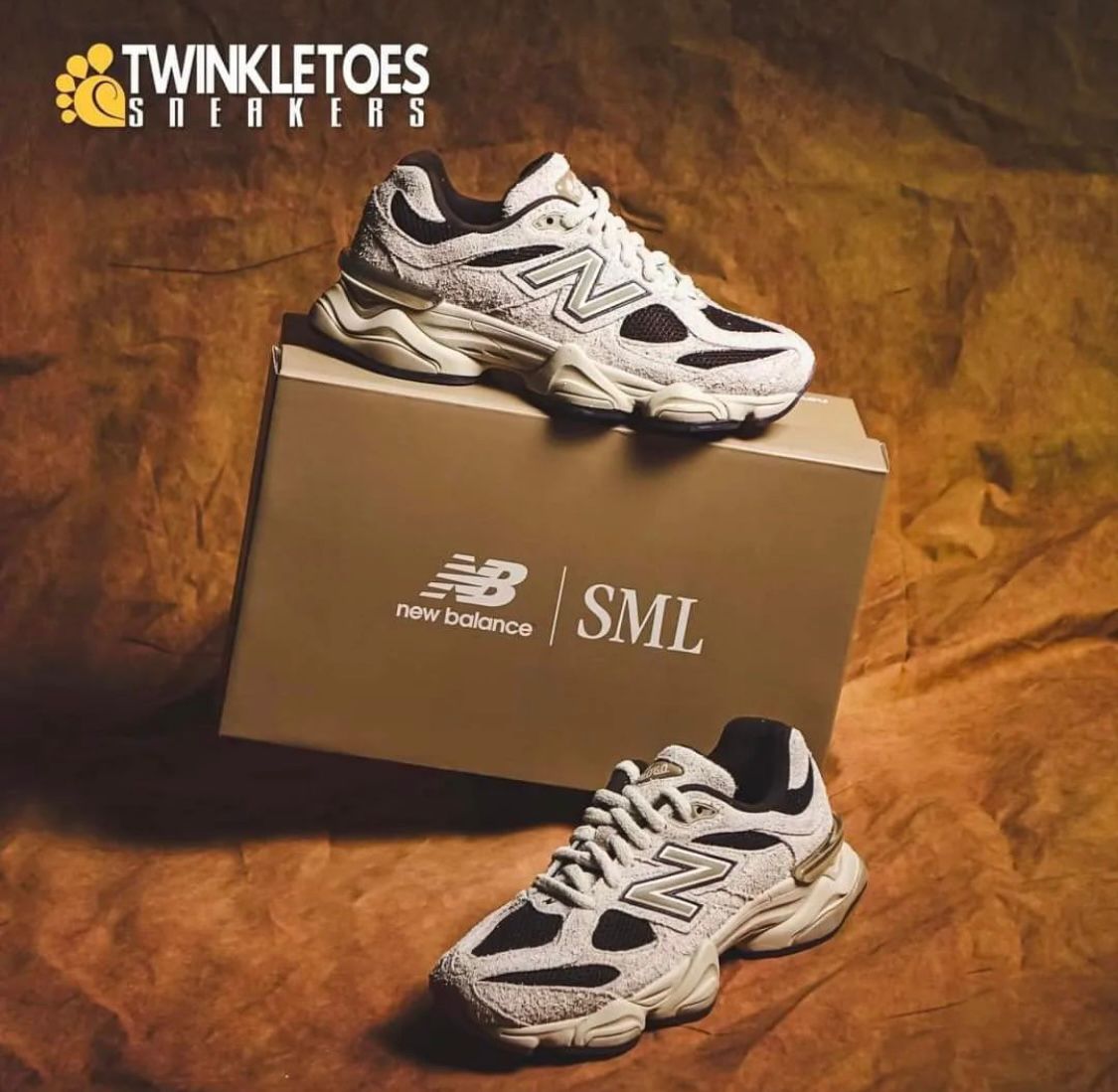 WhatsApp_Image_2024-07-27_at_01.11.32 | UAE SPORT STORE Two white and black New Balance sneakers displayed on and beside a brown shoe box with SML branding; Twinkletoes Sneakers logo in the top-left corner.