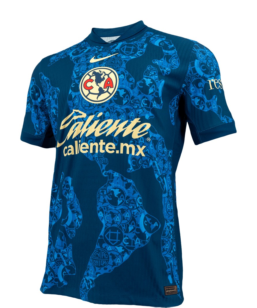XgL9KkeSTdT7BSL | UAE SPORT STORE Blue soccer jersey with Club América crest and 'Valiente caliente.mx' sponsor, short sleeves, abstract pattern in lighter blue.