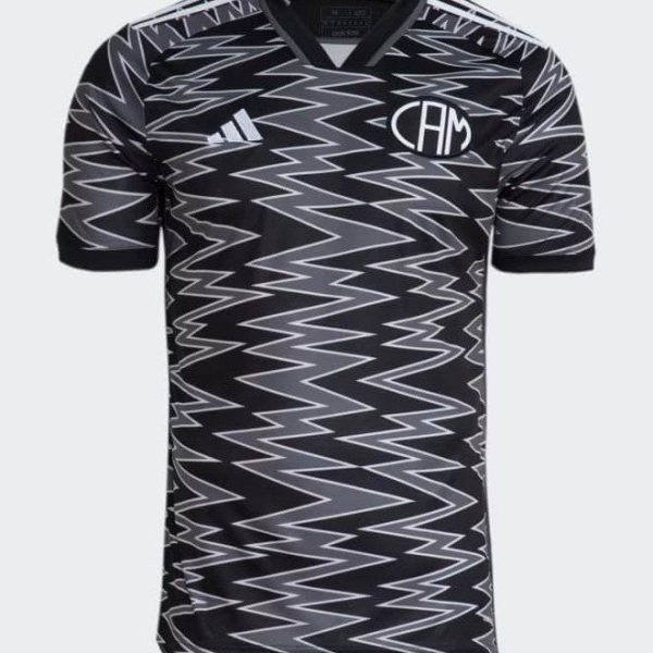 Black and gray zigzag-pattern soccer jersey with Adidas logo on the left chest and a circular crest on the right chest.