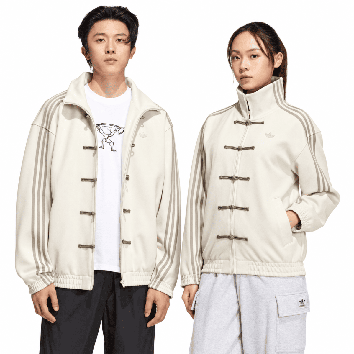 Two models wearing beige adidas casual jackets with stripes, front view.