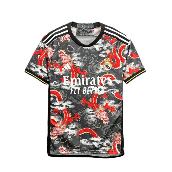 Real Madrid football jersey with gray dragon pattern, white Emirates sponsor, crest on chest and three white shoulder stripes on top.