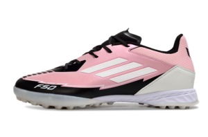 Pink and black soccer shoe with white stripes and 'F50' branding, designed for speed