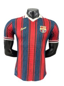 a3da91b7_ac64e8d1-3109-4d07-8211-ed996461a509 | UAE SPORT STORE Barcelona football jersey on a mannequin with red and blue vertical stripes and the club crest on the left chest.