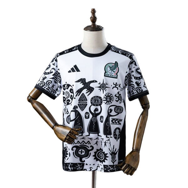 White athletic tee with black tribal patterns, Adidas logo, and Mexico crest on a dress form mannequin