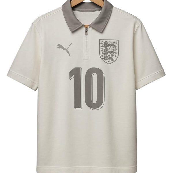 Cream England football jersey on a wooden hanger with gray collar, featuring the crest and a large number 10 on the front with a PUMA logo.