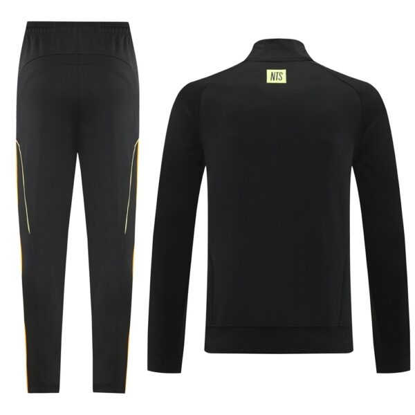 Black athletic tracksuit: pants with subtle gold/yellow side panels and a matching long-sleeve zip-free jacket with a small NTS label on the back neck.