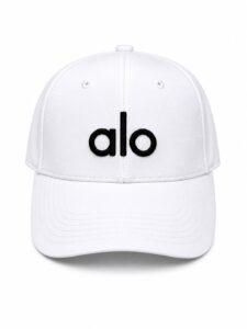 White baseball cap with a black embroidered 'alo' logo on the front center, front view