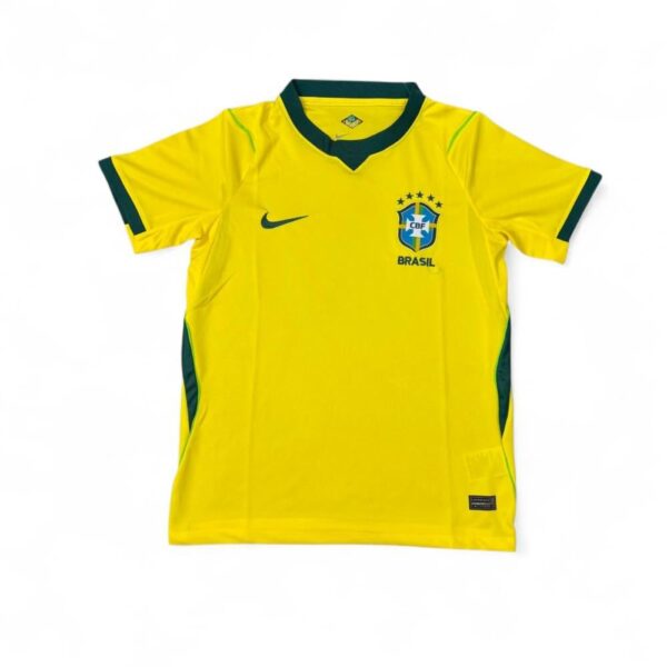 Brazil national football jersey: bright yellow with green trim, chest crest, and Nike swoosh