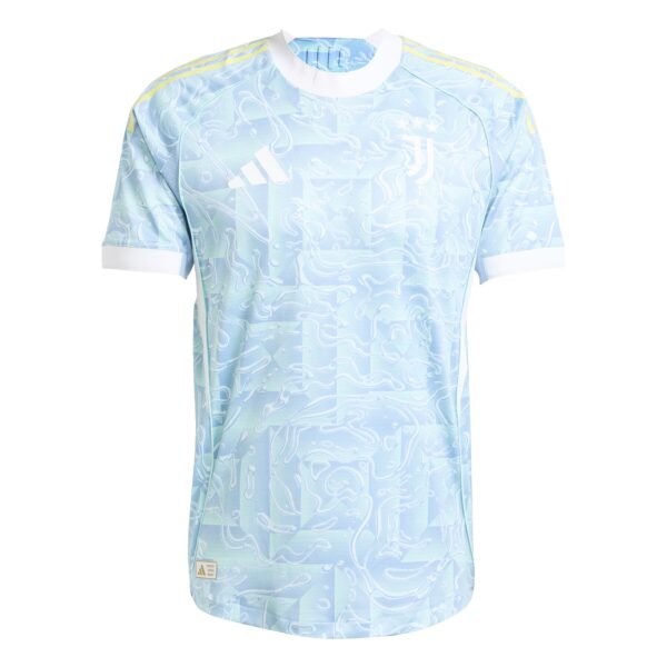 Light blue patterned sports jersey with white collar and shoulders, featuring an Adidas logo on the chest and thin yellow stripes along the sleeves.