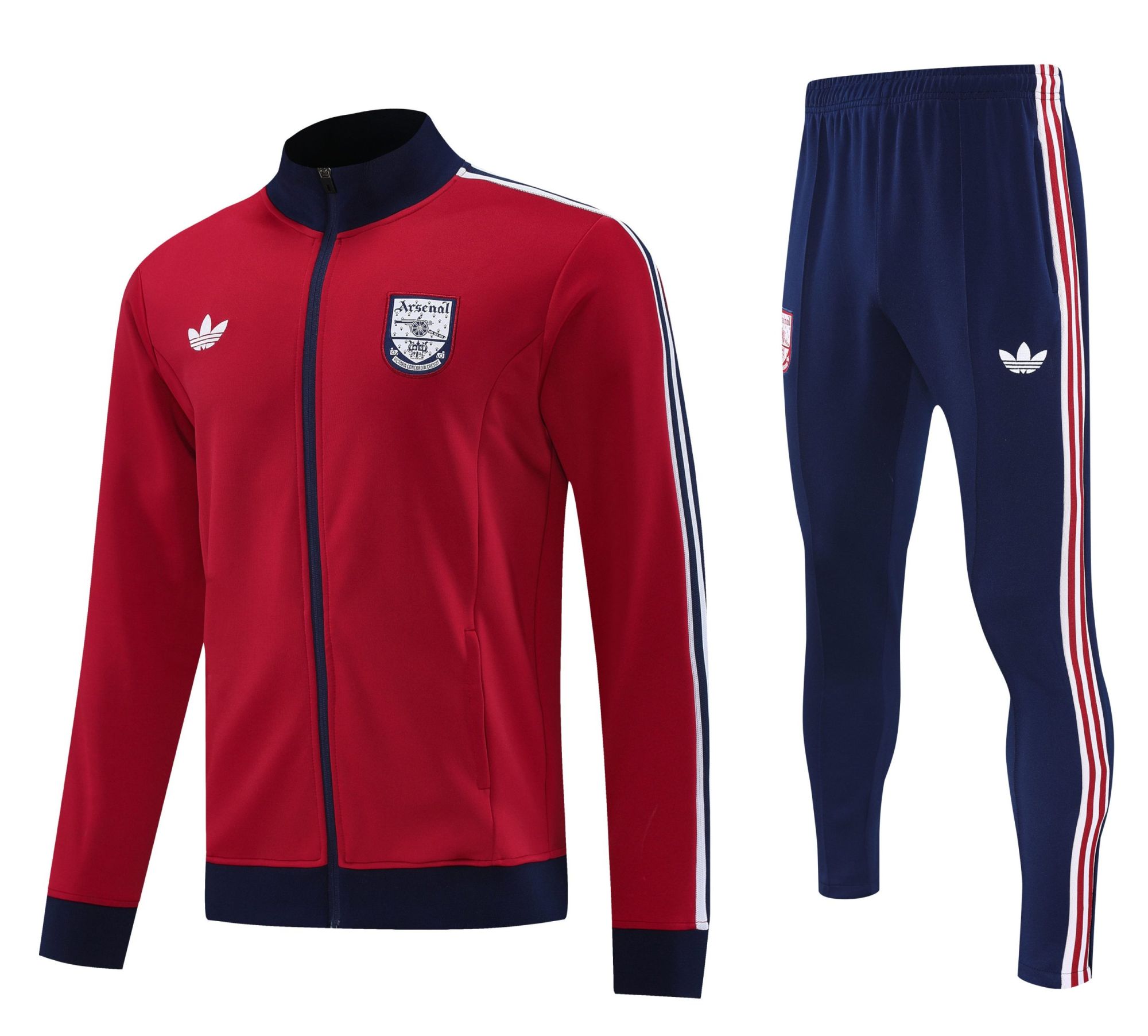 af56a953 | UAE SPORT STORE Red Arsenal track jacket with navy collar and crest, beside navy track pants with red/white stripes.