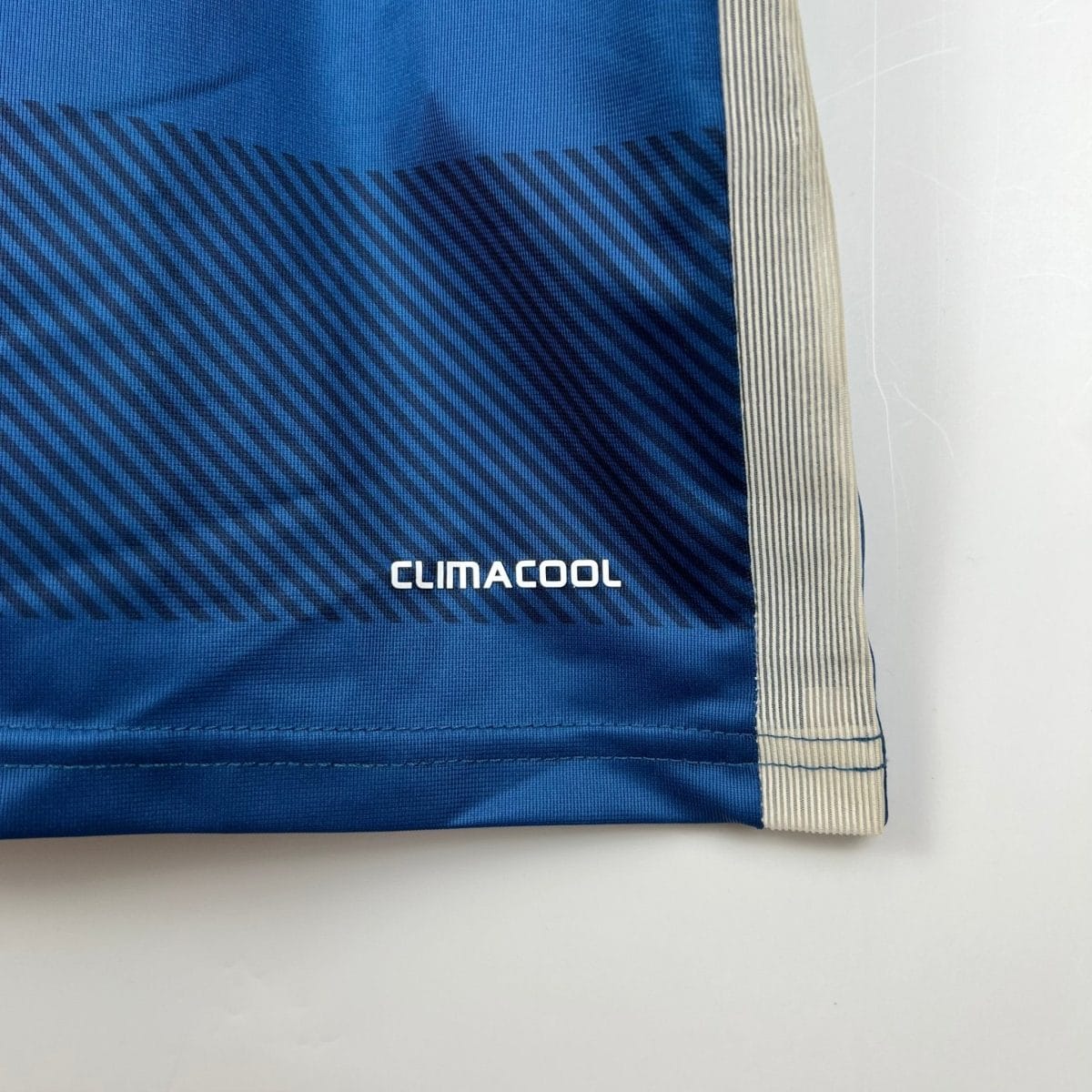 Dark-blue Argentina shirt, lower hem and Climacool mark detail