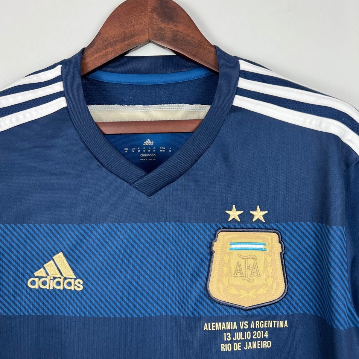 Dark-blue Argentina shirt, collar and chest detail on hanger