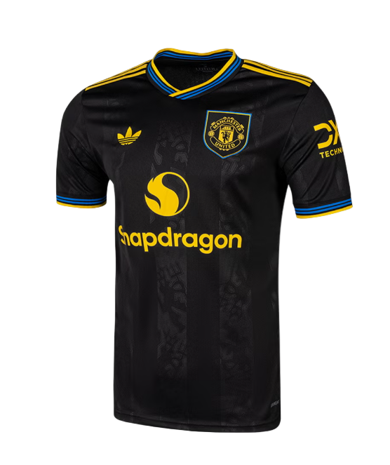 Black Manchester United soccer jersey with yellow sponsor logo Snapdragon and crest, blue-yellow trim on collar and sleeves.