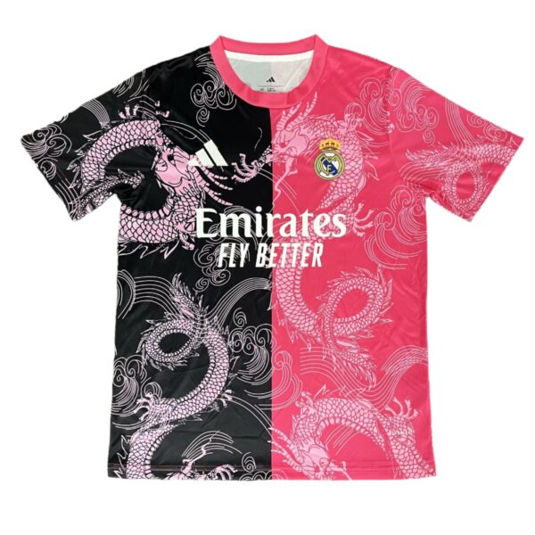 Split-color Real Madrid jersey: black left half, pink right half, dragon pattern, crest, Adidas logo, and 'Emirates Fly Better' text.