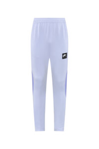 b14f4403 | UAE SPORT STORE Light lavender Nike Air track pants with a small black logo patch on the upper leg.