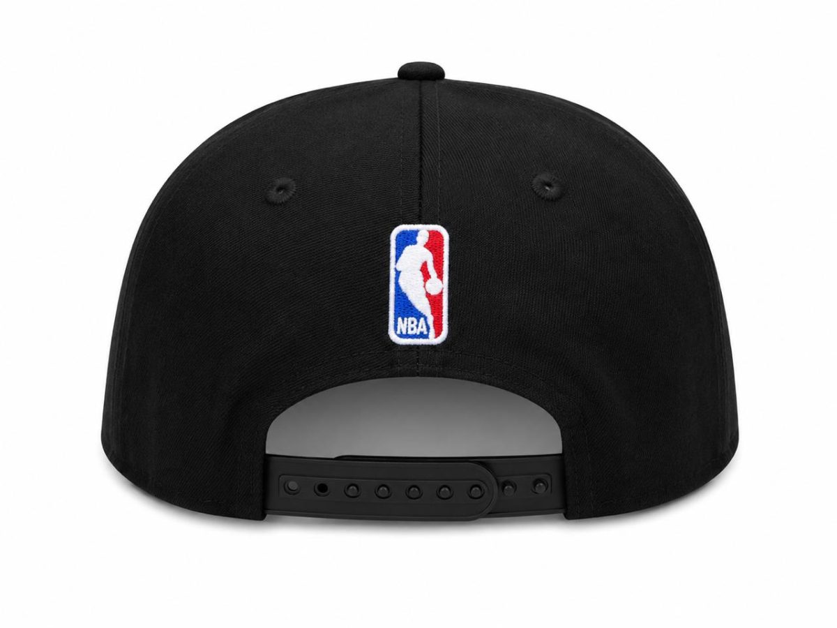 Back view of a black baseball cap with an NBA logo patch on the crown and an adjustable strap at the back.
