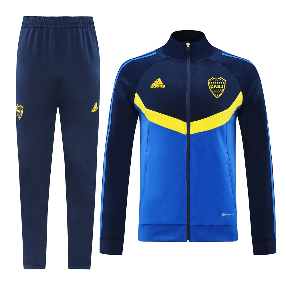 b36ef925 | UAE SPORT STORE Blue and yellow Boca Juniors track suit: zip-up jacket and matching navy pants with club crest and Adidas logos.