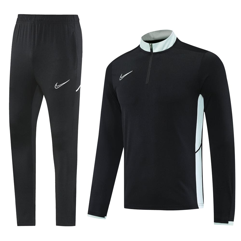 b4091161 | UAE SPORT STORE Black Nike tracksuit with light blue side panels: zip-neck top and matching jogger pants, brand logos visible