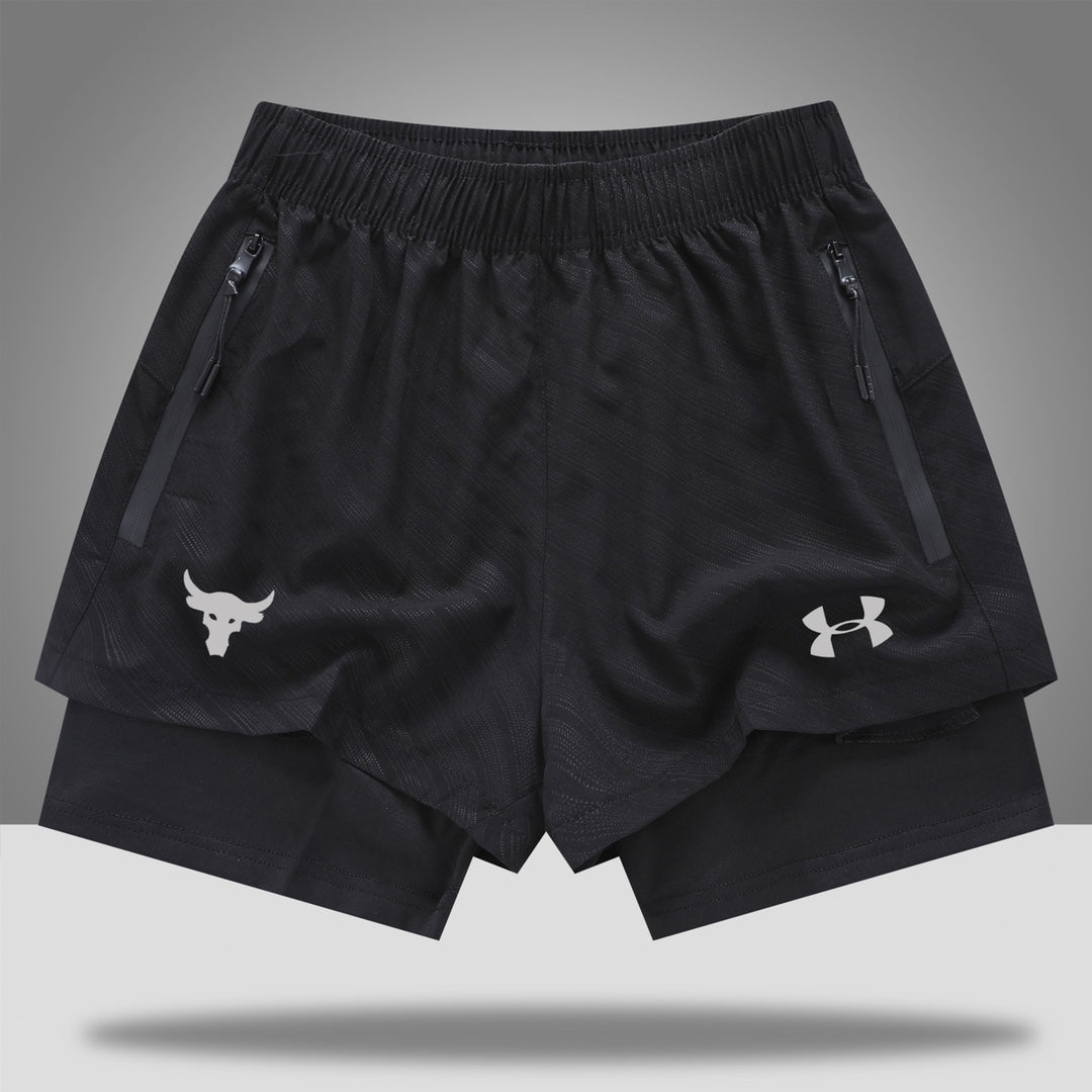 b49be0ba | UAE SPORT STORE Black athletic shorts with elastic waistband, zip pockets, and white logos on each leg (Under Armour on the right, bull head on the left).