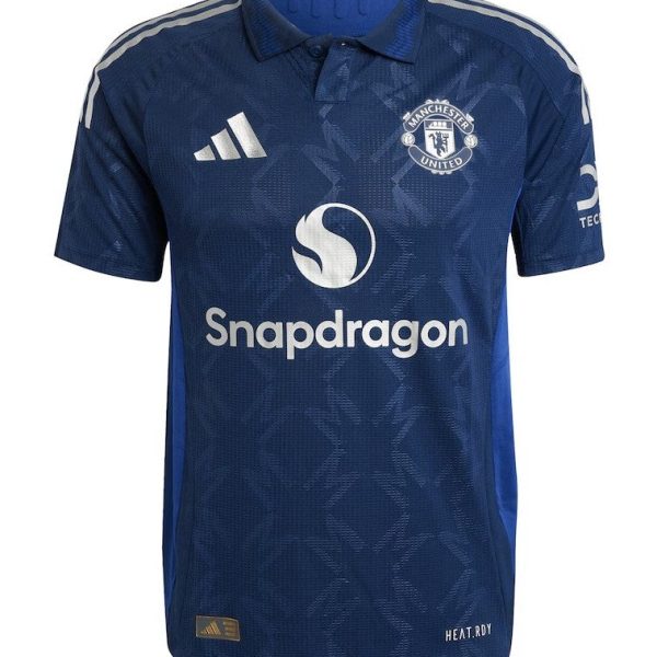 Blue Manchester United football jersey with Snapdragon sponsor on the front and club crest visible (front view).