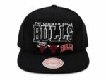 Black Chicago Bulls snapback hat with embroidered logo and adjustable fit.