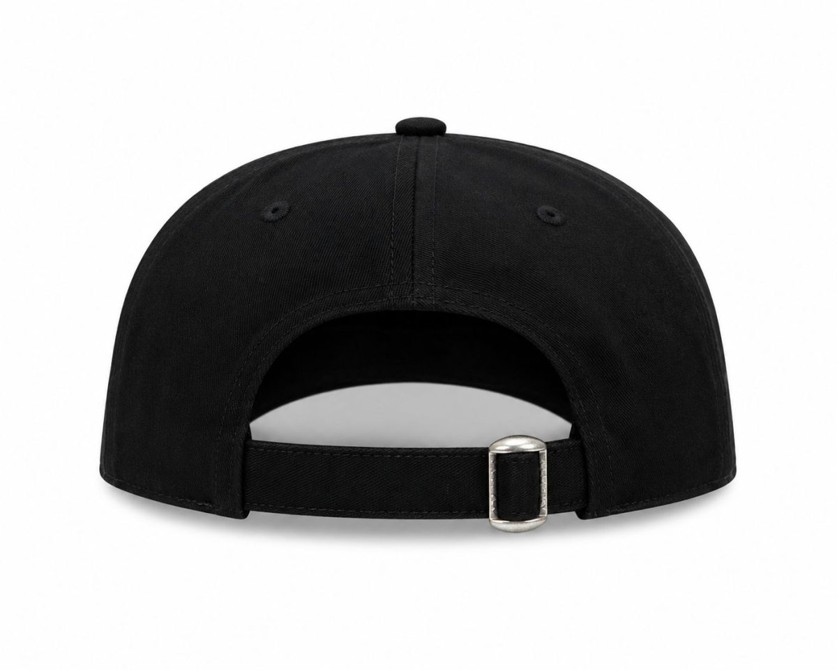 Back view of a black baseball cap showing an adjustable strap with a silver buckle.
