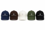 Classic football cap with embroidered logo, available in navy, brown, white, green, and black. Perfe.