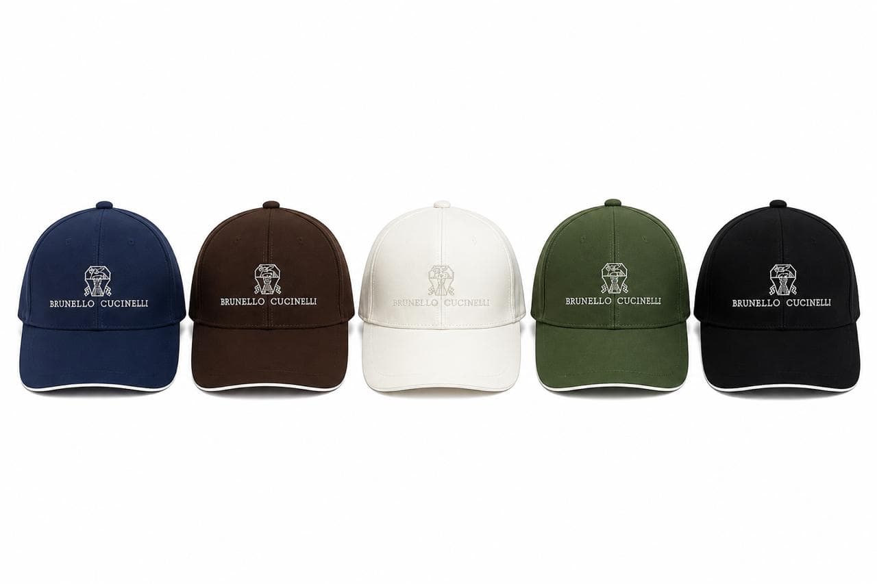 Classic Football Cap in Multiple Colors - UAE SPORT STORE Classic football cap with embroidered logo, available in navy, brown, white, green, and black. Perfe.