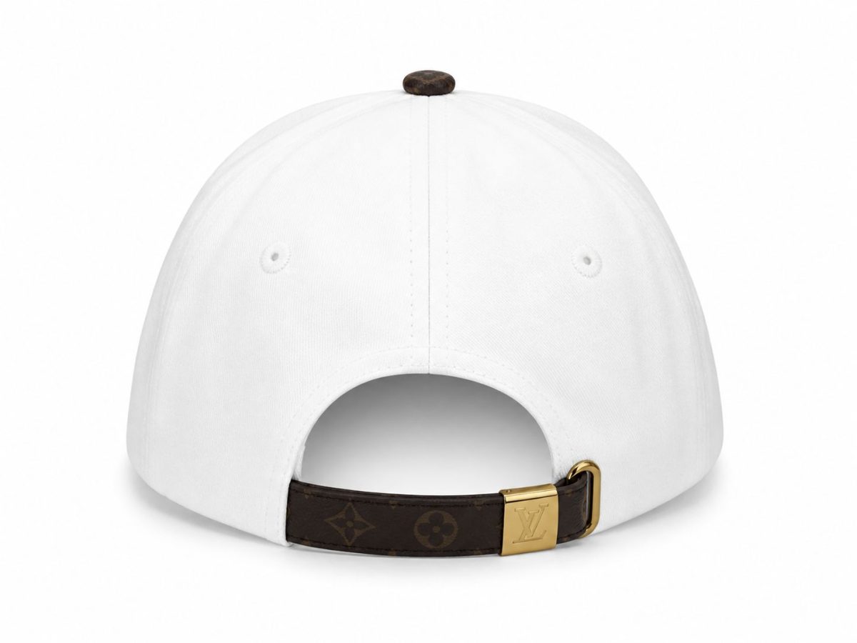 Back view of a white baseball cap with an adjustable brown LV strap and gold buckle