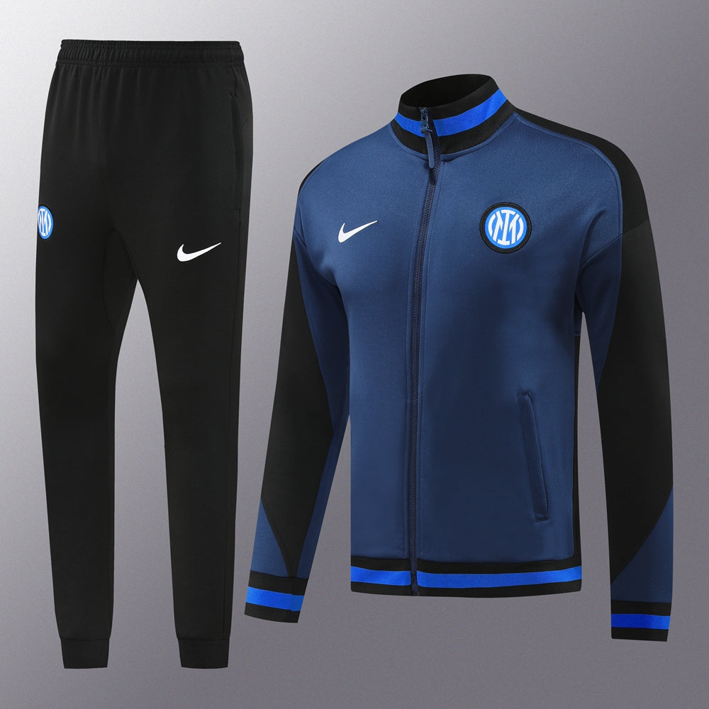 b6defdd6 | UAE SPORT STORE Blue and black Inter Milan track jacket with zip, shown with matching black joggers featuring Nike logos and crest on chest/leg.
