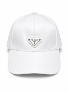 b85afc24-6f19-4665-a94c-3bd987524861 | UAE SPORT STORE White Prada baseball cap with a triangular Prada logo badge on the front panel label.