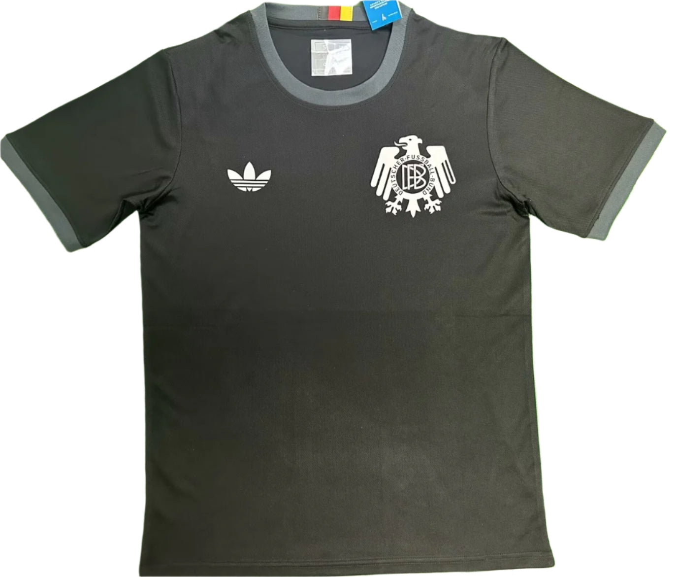 b87538d3-02a3-4ecb-bc19-b025de49e5dd Black short-sleeve sports T-shirt with Adidas logo on the left chest and a white German football federation crest on the right chest.
