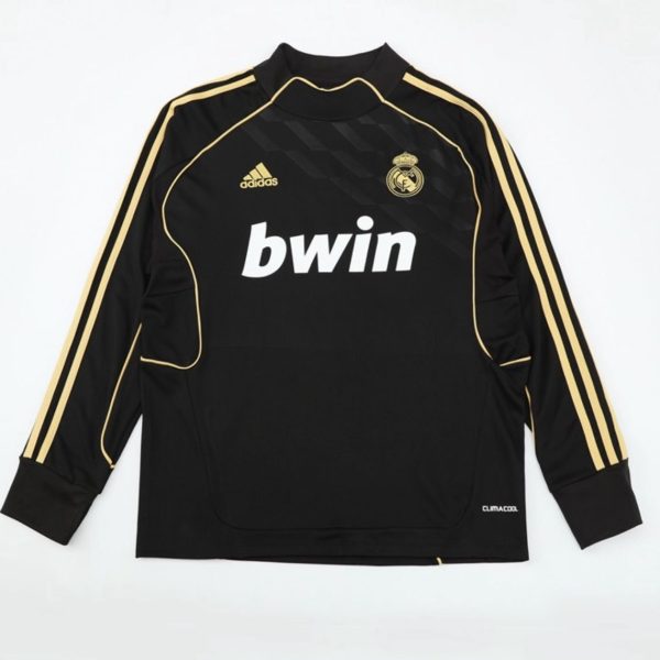 Black Real Madrid goalkeeper jersey with gold piping, Adidas logo, club crest, and 'bwin' sponsor on chest.