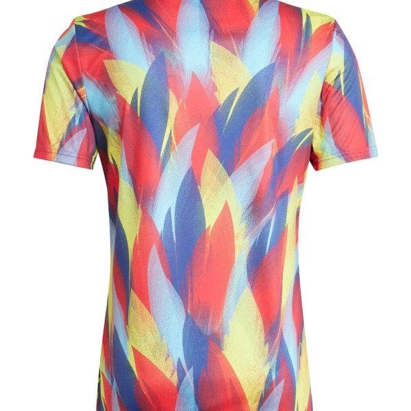 Back view of a short-sleeve shirt with a vibrant abstract red, yellow, blue pattern.