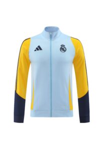 Light blue track jacket with yellow sleeves, full-length zipper, Real Madrid crest and Adidas logo.