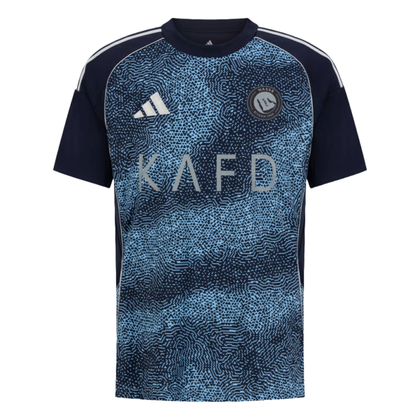 Blue and navy patterned athletic jersey with 'KAFD' across the chest, Adidas logo on the left and a circular club crest on the right chest.
